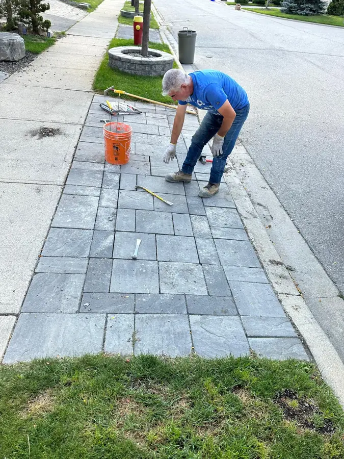 Interlock walkway being installed