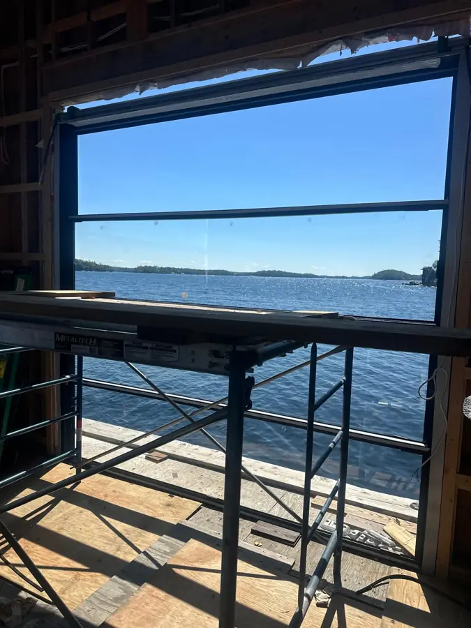 Large window frame with lake view